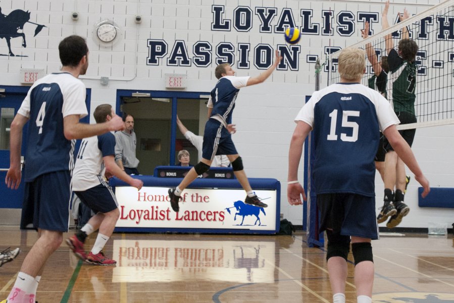 BELLEVILLE, ON (07/12/11) Josh Lappala of the men's volleyball team leaps for the ball after a quick recovery by the Lancers. Photo by Keenan Weaver.