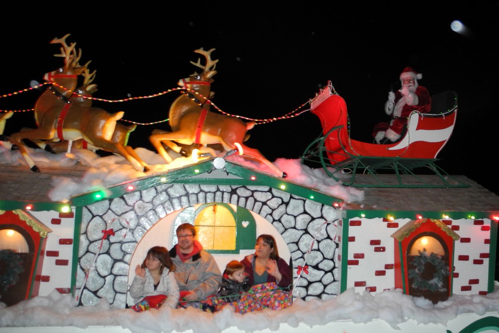 BELLEVILLE - Santa Claus rides his sleigh through the parade route. Photo by Katy Burley