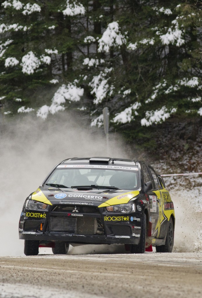 BANCROFT, Ont. [30/11/2013] Antoine L'Estage and his co-driver Craig Parry drift across the gravel road in their 2011 Mitsubishi Evo X on Saturday, Nov. 30, 2013 at the 43rd annual Rally of the Tall Pines in Bancroft, Ont. L'Estage and Parry finished second in the National four-wheel open competition and second overall at the rally. Photo by Kaitlin Abeele