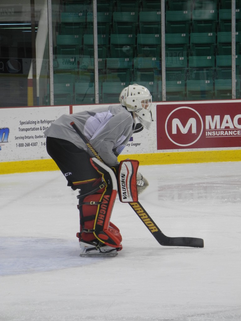 Connor Hicks, Belleville Bulls backup goaltender stands at the top of crease awaiting shots at practice. Photo by: William Proulx