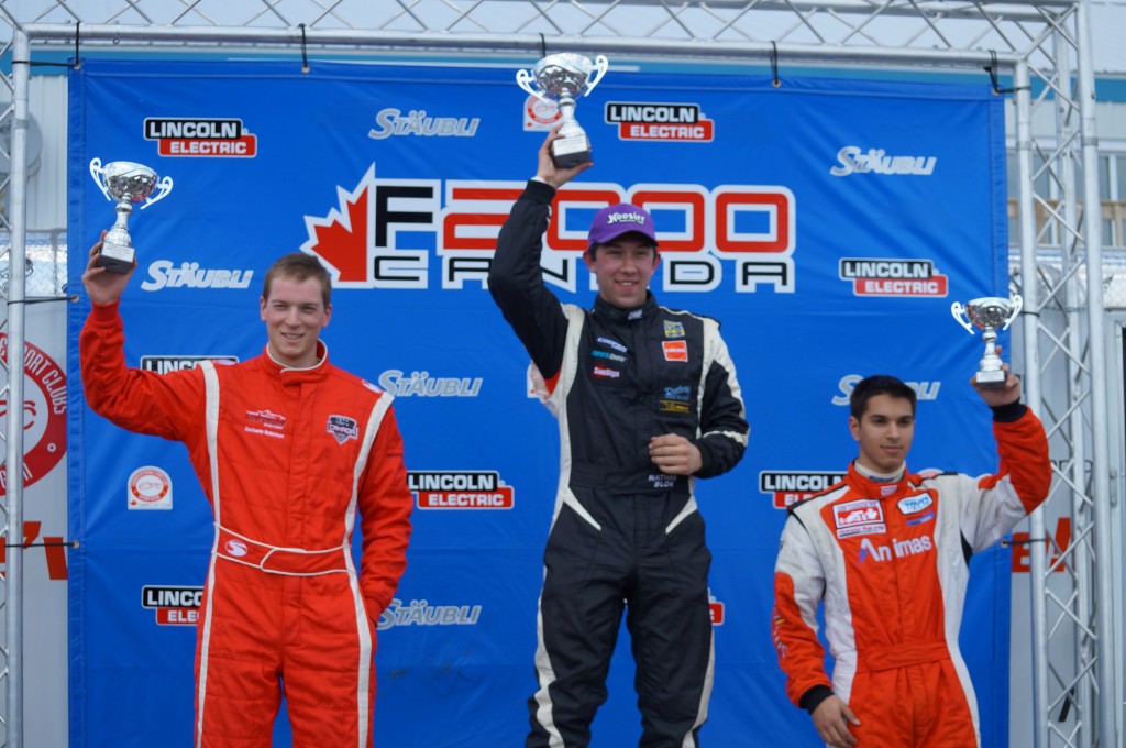 Nathan Blok (centre) standing victorious on the podium after a race at Canadian Tire Motorsport Park in Bowmanville, Ont. May 2, 2015. The race was part of the Canadian F2000 series. Zacharie Robicon came in 2nd (left) and Chase Pelletier came in 3rd for the race. Blok would go on to win the F2000 championship. Photo courtesy Nathan Blok