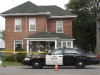 (CAMPBELLFORD 08/15/11) Police outside of Beryl Nicholas' house in Campbellford during a homicide investigation after Nicholas was found dead in her home on Saturday. Photo by Jennifer Bowman