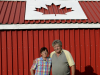 TRENTON ONT (27/06/2011) Ted Sargent and his wife Maureen Sargent stand in front of their Canada flag themed shed. Ted built the shed partly as a competition with his neighbor. Who could be more patriotic? He also hoped that CFB Trenton pilots could see it from the air. He once asked a pilot if he could see it, but the pilot said he was to busy looking for the runway. For Maureen showing off the Canadian flag is also to honour her father who fought in the Second World War. Photo by Linda Horn