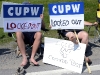 BELLEVILLE ONT (15/06/2011) Locked out Canada Post employees Carol Tebo and Sheldon Savard joins  demonstration picket in Belleville. Canada Post decided to lock out its employees due to the cost, and safety concerns of the rotating strikes. Photo by Linda Horn