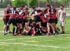 BELLEVILLE, ON (26/05/2011) COSSA Senior Rugby finals. Coach of the Fenelon Falls High School Falcons is tackled by his team after winning. Photo by Steph Crosier