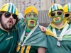 TORONTO, Ont. (25/11/2012) â Close friends and Edmonton Eskimos fans Marco Derosa, Max Bentley, Tyler Boykiw and Bryan Bartman (l-r) make their way to the Rogers Centre for the 100th game armed in their teams colours. They got their tickets last July and will be watching the game from the 600 level.  Photo by Julia McKay