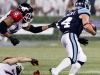 TORONTO, Ont. (25/11/2012) - Toronto Argonauts running back Chad Kackert evades two Stampeders at the 100th Grey Cup game in Toronto, Ont. Sunday Nov. 25, 2012. The Toronto Argonauts beat the Calgary Stampeders, 35-22, to win the Grey Cup. Photo by Tom Hicken.