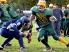 Chargers running back #25 Sam Chartrand braces for impact as he moves the ball up the field. Chartrand scored a touchdown and set up another in Friday's 31-7 win over the Quinte Saints. 
Photo by Andrew Mendler