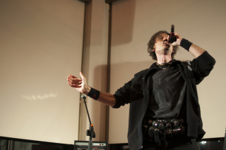 BELLEVILLE, Ont (13/10/11) - Dan Ouellette, a metal harmonicist, plays for the crowd in Alumni Hall Wednesday November 30th 2011. Oullette was just one of the acts on stage as part of the Benefit Concert for the Quinte and District Sex Assault Center. Photo by Andre Lodder