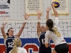 BELLEVILLE, Ont. (14/01/12) â Leanne Jeffs and Jenny Richardson of the Loyalist Lancers attempt to block the volley of Shawna Metcalf of the Cambrian Golden Shield during the women's volleyball game against the Loyalist Lancers held at Loyalist College in Belleville, Jan. 14, 2012. The Lancers lost all three sets to the Golden Shield. Photo by Melchizedek Maquiso.