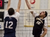 BELLEVILLE, Ont. (14/01/12) â Ian Hortop of the Loyalist Lancers tries to block the volley of Scott Anderson of the Cambrian Golden Shield during the men's volleyball game against the Loyalist Lancers held at Loyalist College in Belleville, Jan. 14, 2012. The Lancers defeated the Golden Shield 3-0. Photo by Melchizedek Maquiso.