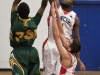 BELLEVILLE, Ont (31/01/12) - Calvin Chevannes and Matt Miller of the Loyalist Lancers attempt to block the shot of Kameron Cyril of the Fleming Knights during Tuesday's basketball game held at Loyalist College.  The Knights won 79-72.  Photo by Melchizedek Maquiso.