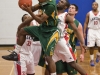 BELLEVILLE, Ont (31/01/12) - Brandon Chambers of the Fleming Knights battles for the rebound against Loyalist Lancers' Patrick Kalala and Calvin Chevannes during the first half of the men's basketball game held at Loyalist College.  The Knights won 79-72.  Photo by Melchizedek Maquiso.
