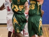 BELLEVILLE, Ont (31/01/12) - Brandon Chambers and Alex Holland of the Fleming Knights and Calvin Chevannes of the Loyalist Lancers battle for the rebound during the first half of the men's basketball game held at Loyalist College.  The Knights won 79-72.  Photo by Melchizedek Maquiso.