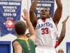 BELLEVILLE, Ont. (31/01/12) - Max Clarkson of the Fleming Knights attempts to block a field goal attempt by Patrick Kalala of the Loyalist Lancers during the  men's basketball game held at Loyalist College.  The Knights won 79-72.  Photo by Melchizedek Maquiso.