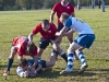 Loyalist Lancers Devin Reid and Luke Shillington press an Algonquin Thunder player during the OCAA Tier II men's rugby championship. Photo by Ashliegh Gehl.