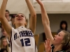 BELLEVILLE, Ont. (11/11/11) - Michelle Bunton of the St. Theresa Titans and Brooke Lansburry of the Nicholson Crusaders battle for the rebound during  the Bay of Quinte girls basketball championship held at the St. Theresa Catholic School gymnasium. The Titans won 47-26 to clinch senior the championship.  Photo by Melchizedek Maquiso