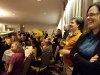 BELLEVILLE, Ont. (11/11/2011)- Kim, a translater from Kingston, laughs along with the deaf event as they cheer and applaude with their napkins at the Ramada Inn in Belleville, Ont. on Nov. 11, 2011. The waving of the napkins is common in deaf culture to get a full room's attention or  to applaude. Photo by Sarah Schofield