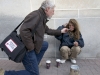 BELLEVILLE, Ont. (11/11/11)â Street nurse Doug Roy lights a friends cigarette with his own. "A street nurse is not very well received by conventional health institutes," says Roy. Photo by Brynn Campbell.