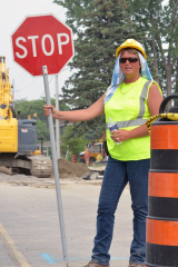 BELLEVILLE, Ont. (29/05/2012) Missy Beaudrie of Co-Co Paving drinks plenty of water to beat the heat. According to Environment Canada, temperatures in Belleville reached 37 degrees with the humidex on Tuesday. Photo by Marc Venema.