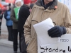 (BELLEVILLE) 11-12-2012 - Michael McMahon, retired teacher and current President of the local NDP Riding Association, overlooks Tuesday's rally at the education center as he passes out papers explaining local plans for battling Bill 115. Photo by Keenan Weaver.