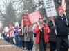 (BELLEVILLE) 12-12-12 - Watt leads a pack of orderly teachers from Prince Charles Public School in a march towards Sidney Street to protest against Bill 115 on Wednesday. He made sure to stay on the sidewalk and off of school property. Photo by Keenan Weaver