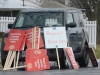 (BELLEVILLE) 12-12-12 - A protester's car near Park Dale Public School is covered with extra signs for the one-day walkouts happening across the district. Photo by Keenan Weaver.