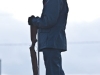 A cadet stands at the corner of the cenotaph in Trenton, Ontario, looking at the hundreds of people who came to the square to pay their respects. Photo by Ashliegh Gehl.