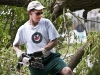 TWEED, On. (06/09/11) David Baker, 47, pulled out the chainsaw Thursday morning to breakdown reminants of a fallen tree on his property. Photo by Ashliegh Gehl.