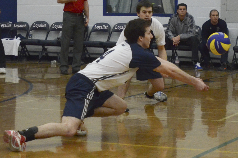 Lancer Jared Bihun digs for the ball during a game against Trent on Saturday, Jan. 26. Photo by Taylor Renkema