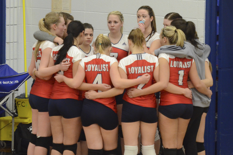 The Lancers try to regroup after losing the second set 25-7. Photo by Taylor Renkema.
