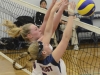 Loyalist veterans Kristen Curtis and Kirsten Talsma (5) block the ball in volleyball action Nov. 28. Photo by Taylor Renkema.