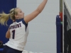 Lady Lancer Jenny Richardson tips the ball over the net. Photo by Taylor Renkema