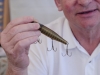 Jim Greenaway from Canadian Antique Fishing Tackle Association has been collecting antique lures  for 20 years and has a couple thousand. The Association's display was set up under the big tent at Centennial Park in Trenton. Photo: Gail Paquette