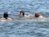 BELLEVILLE, Ont. (21/07/11) Tayler Stacey, 15, (left) Taylor Graham, 17, (centre) and Rob Muir, 17, (right) cooled off by jumping into the Bay of Quinte near the South George Street boat launch. Photo by Renee Rodgers.
