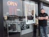 BELLEVILLE, Ont. (02/15/13) - Manager Juliano Akleh is infront of his shop standing next to a legendary tattooist who stopped by all 7 of the Wild Ink locations. A proud moment for the business.