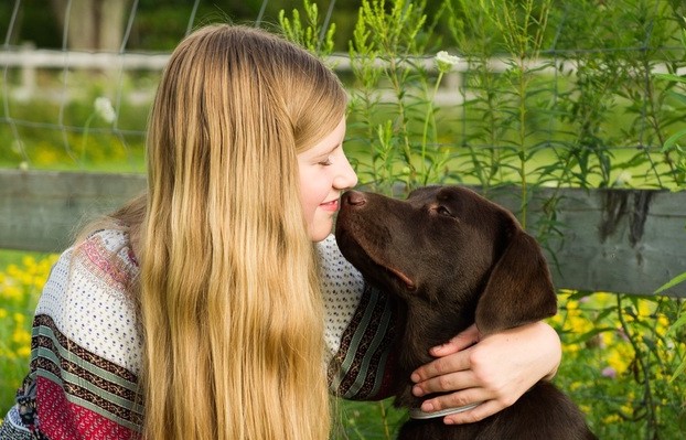 Grace Boyd and her service dog Harley.