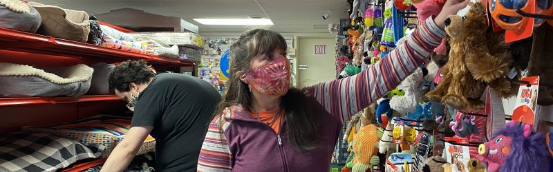 Store owner Suzanne Dufort has run this pet store for over 25 years and says she will miss serving the customers. Chris Parbery, standing behind Dufort, has worked with Dufort the past four years and will continue to work at the store. Photo by Maria Toews, QNet News
